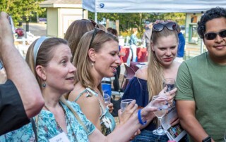 People tasting wines at Cosley Uncorked 2019, photo by Kmiecik Imagery