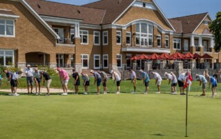 Golfers ready to putt at Arrowhead Golf Course