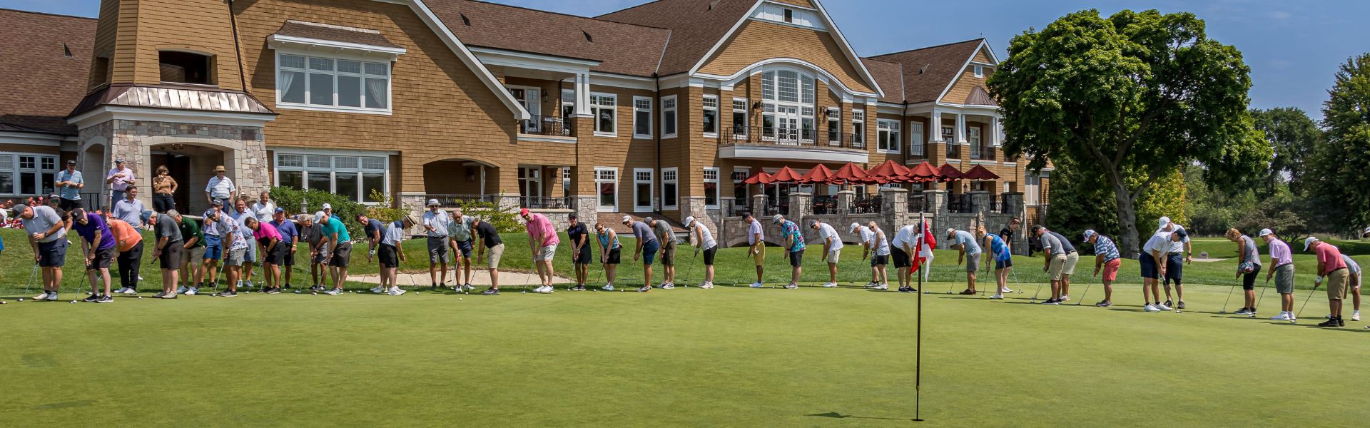 Golfers ready to putt at Arrowhead Golf Course