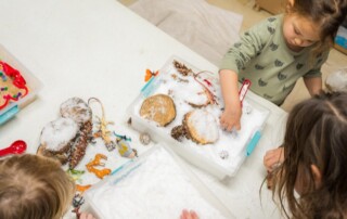 Children at a table making crafts