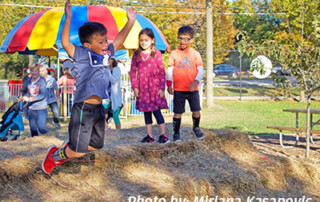 Kids playing at Cosley Zoo during pumpkin fest